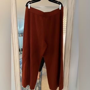Rust colored wide legged sweater pants